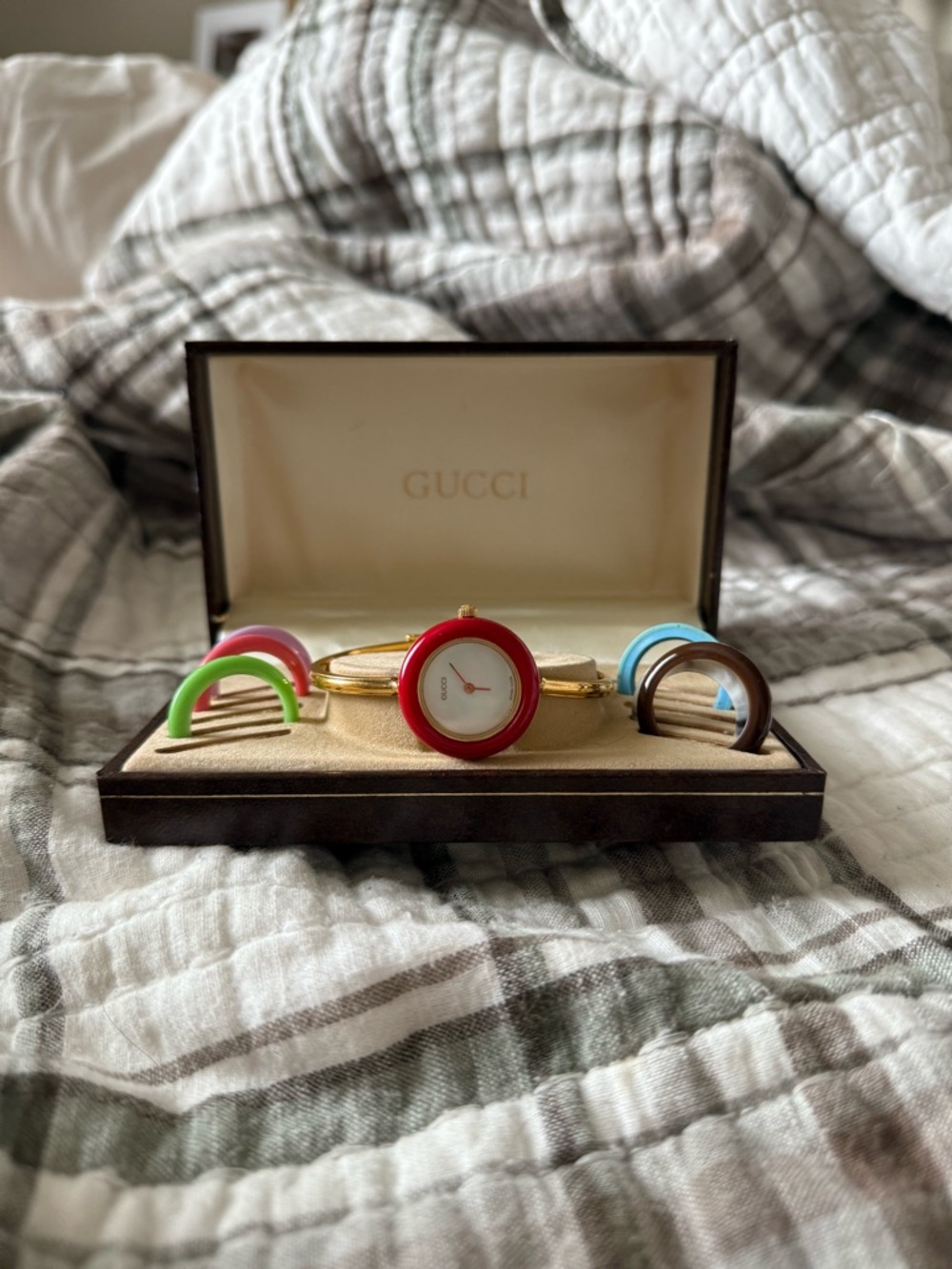 Gucci Gold Bangle Watch with Red and Multicolor Bezels